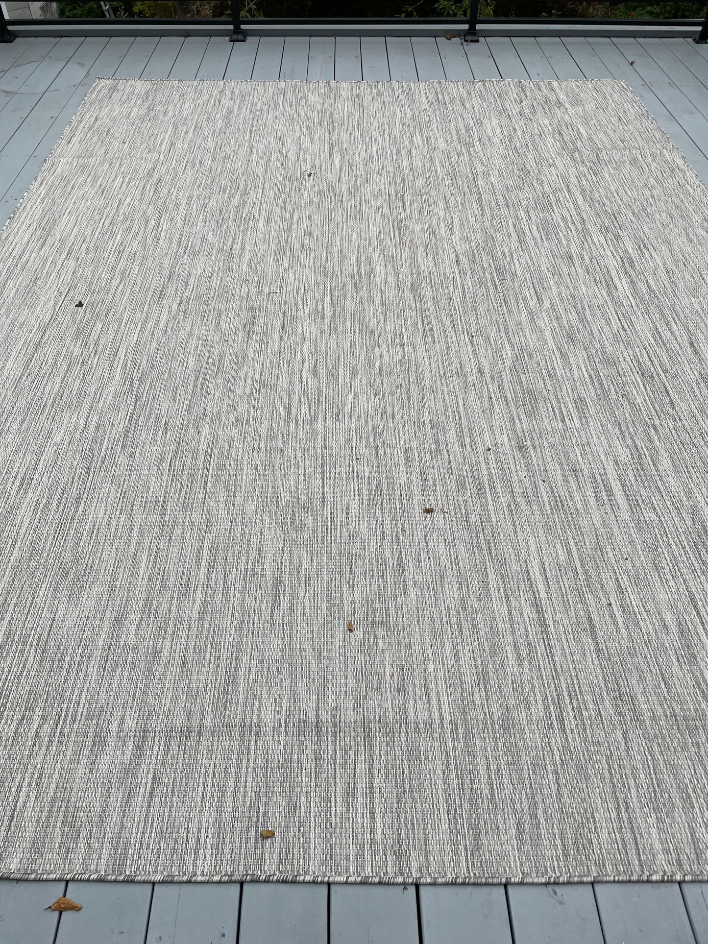 Light gray outdoor rug; 9x12 and 8x10 available