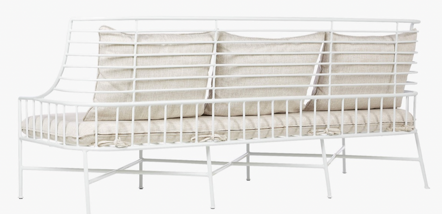 White metal outdoor sofa with bench seat cushion & three back cushion