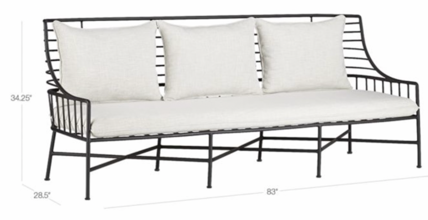Black outdoor sofa with bench cushion & three back cushions