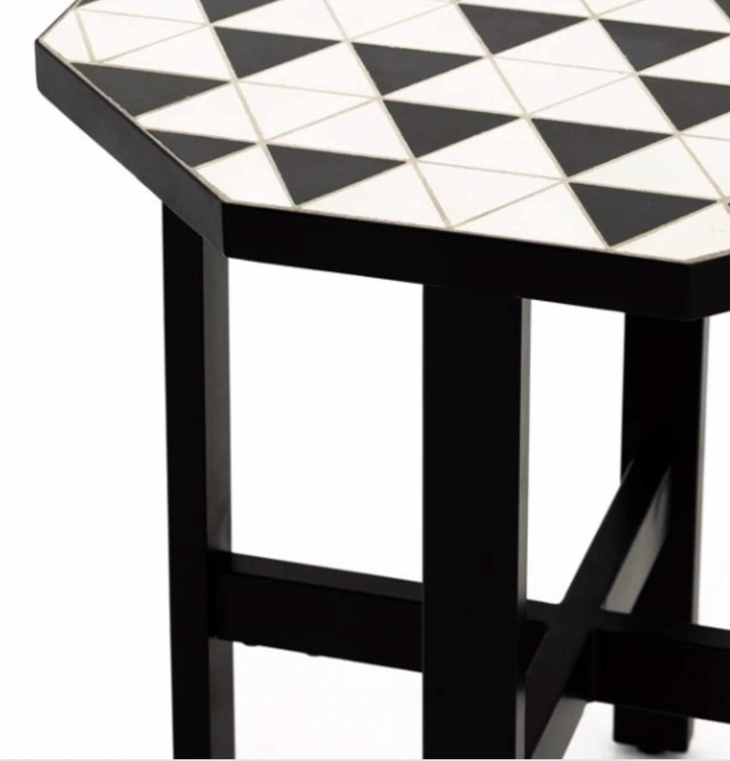 Black and white tiled outdoor side table