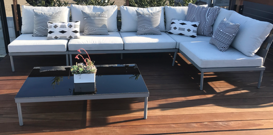 Outdoor sectional with light gray cushions