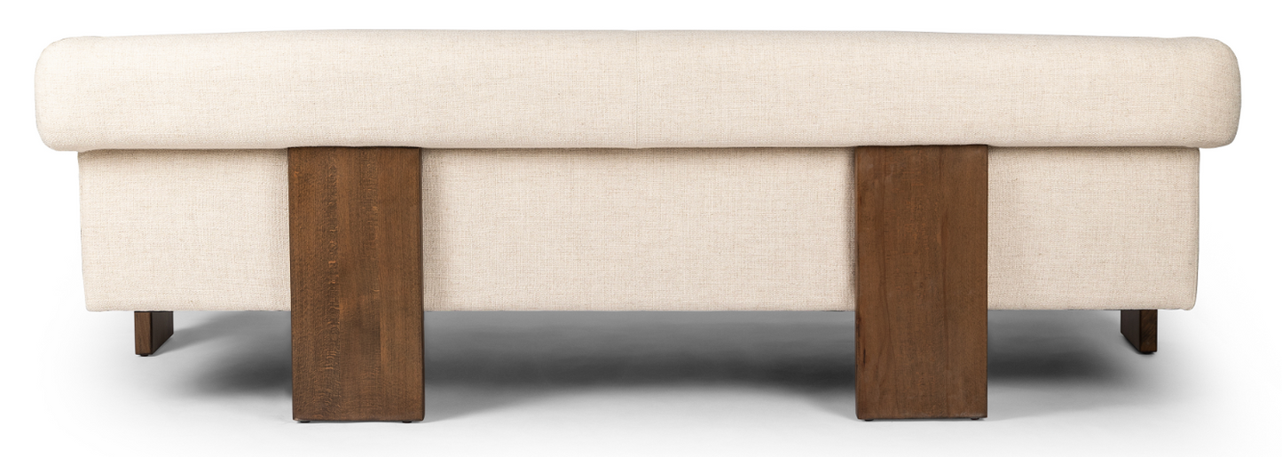 Cairo sofa in cream. Inspired by vintage Brazilian design. Wide plank legs