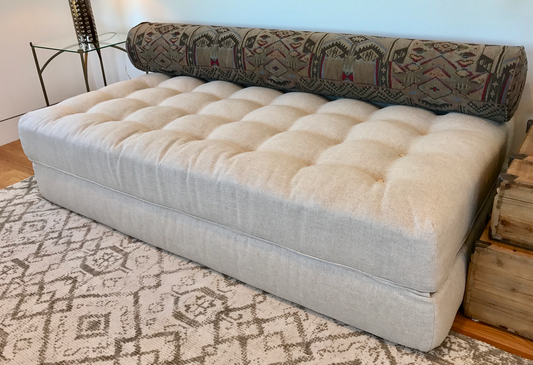 Cream upholstered day bed