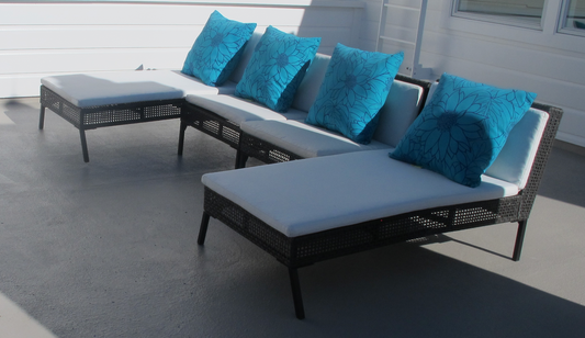Woven resin outdoor sectional with cushions