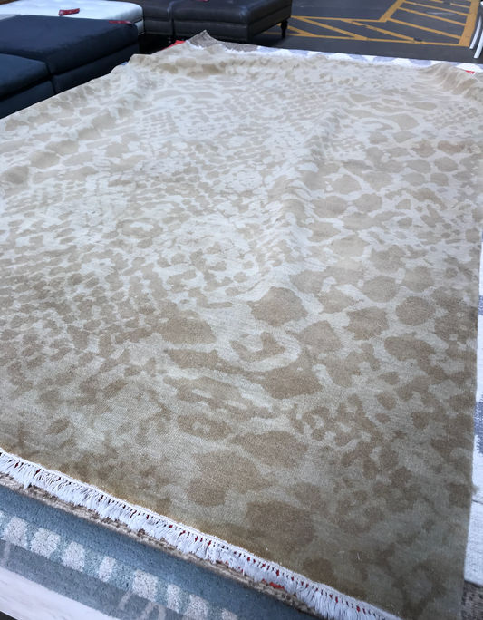 Snakeskin print rug in cream and tan