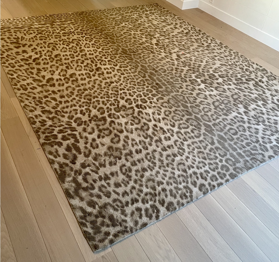 Cheetah print rug in tan and brown