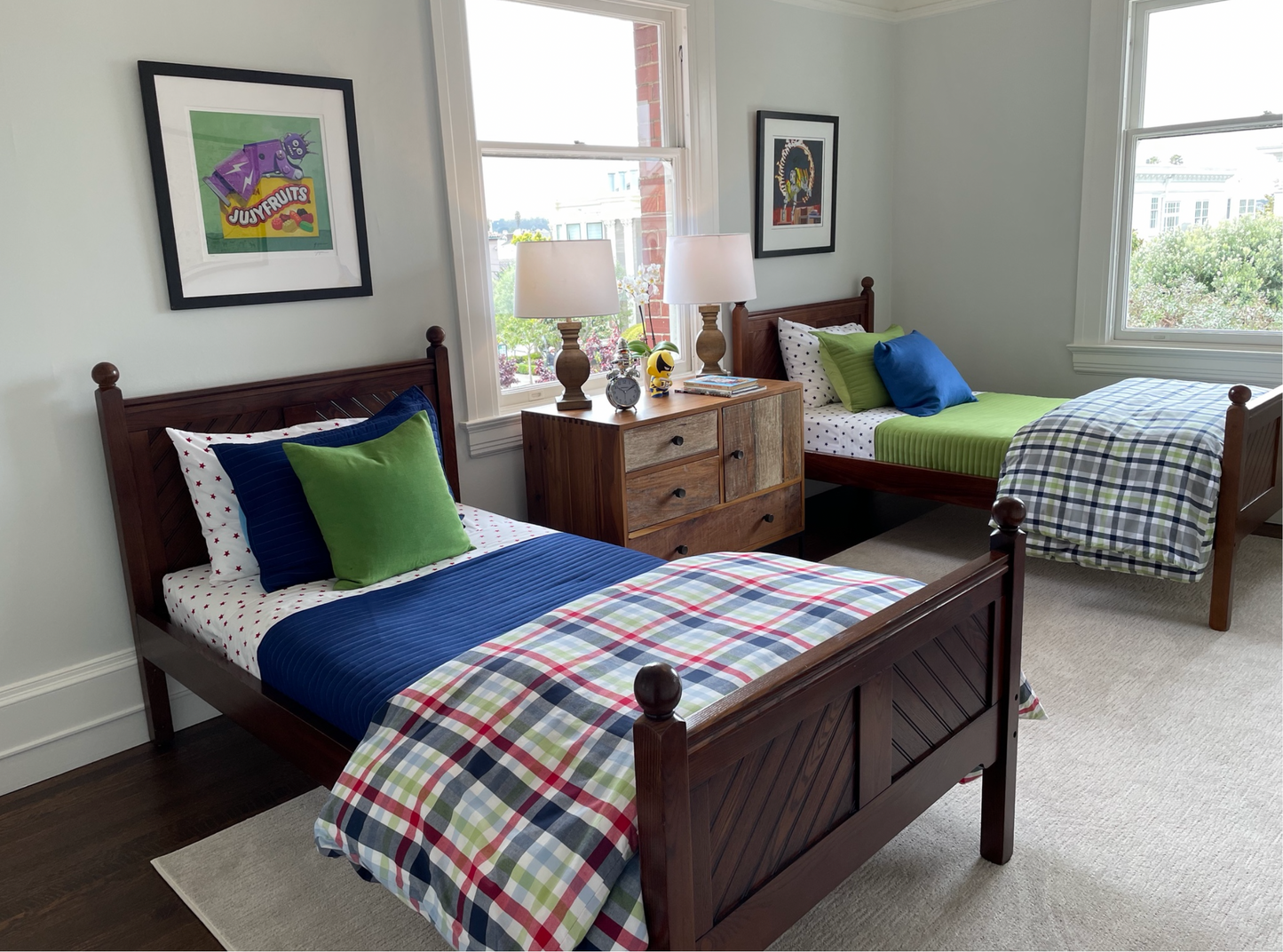 Brown wood twin bed with finials