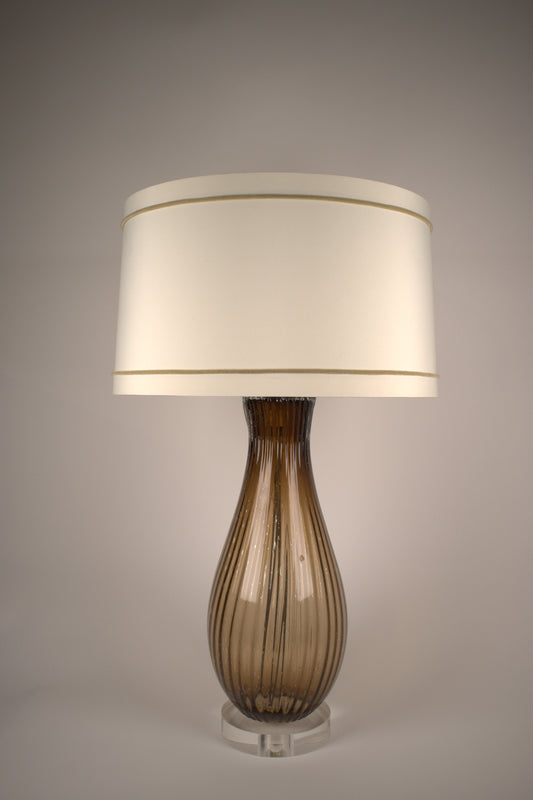 Shapely amber glass table lamp