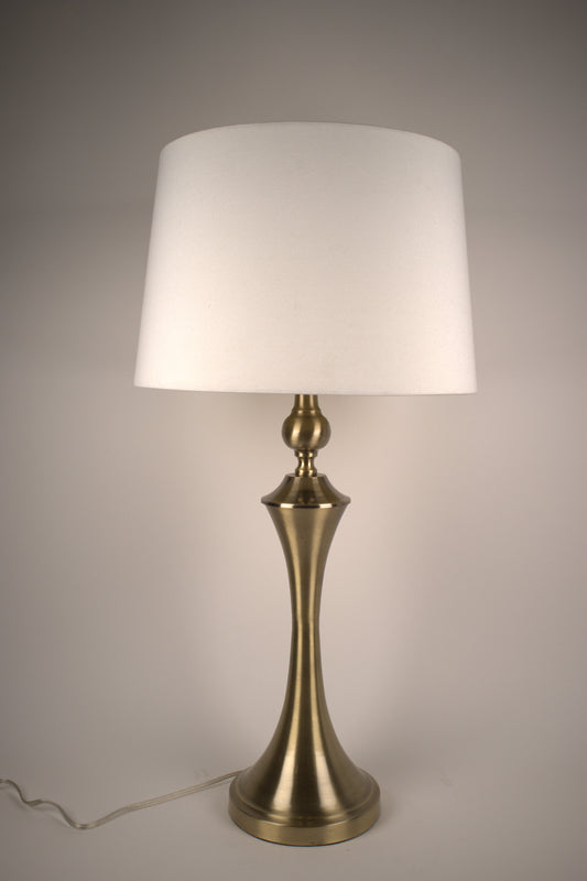 Brass table lamp with thin waist