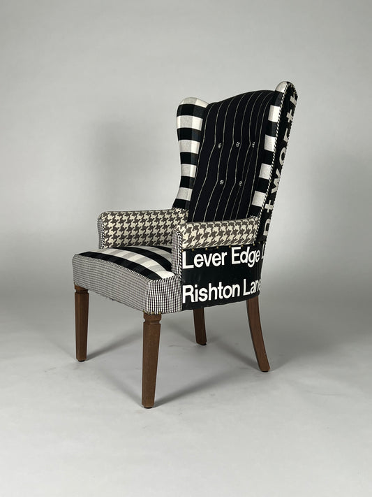 Multi patterned high back chair with vintage transit sign back, v1