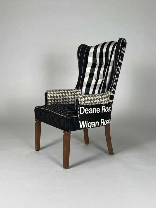 Multi patterned high back chair with vintage transit sign back, v2
