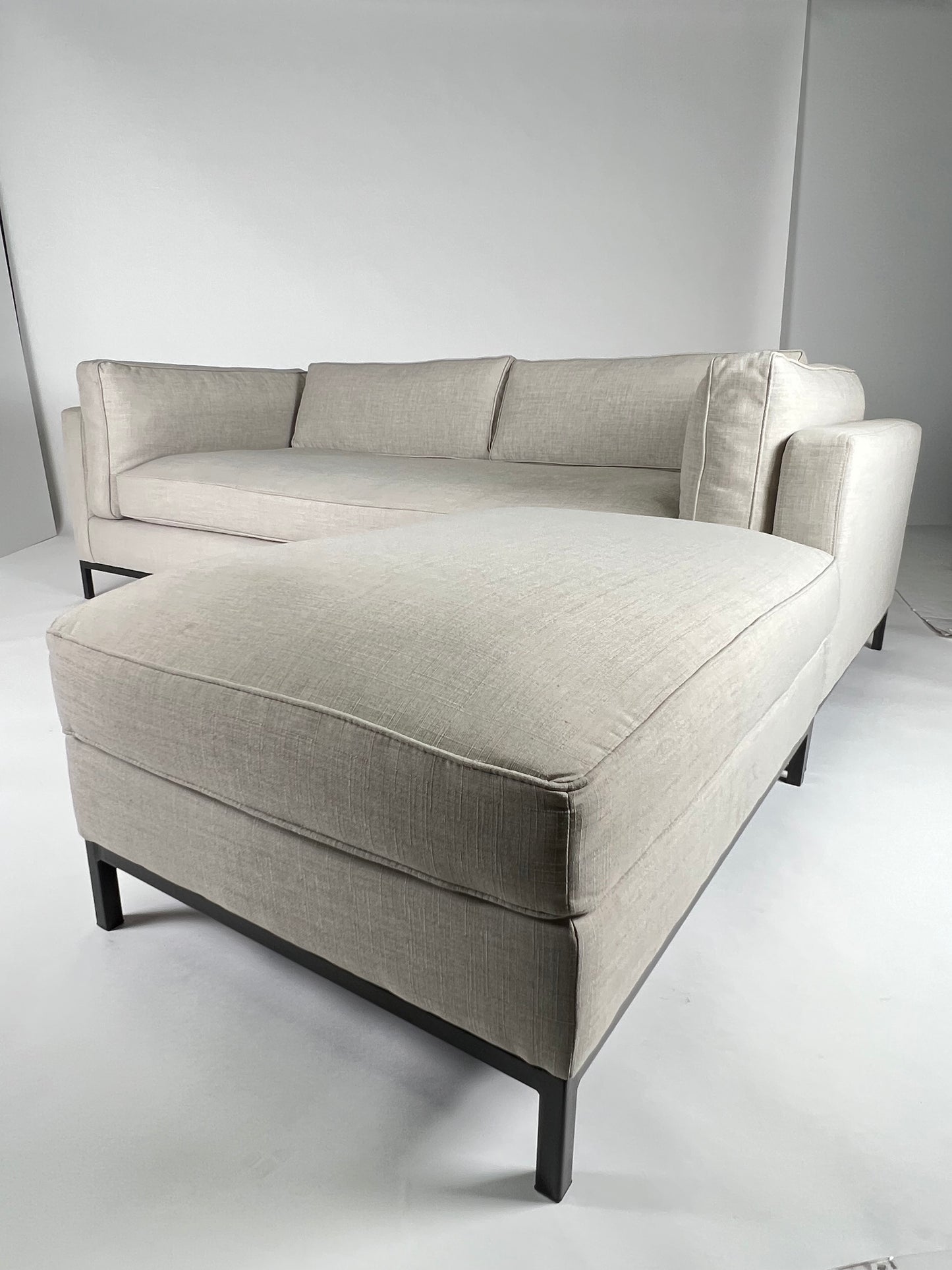 Light gray sectional with black iron base, LAF or RAF