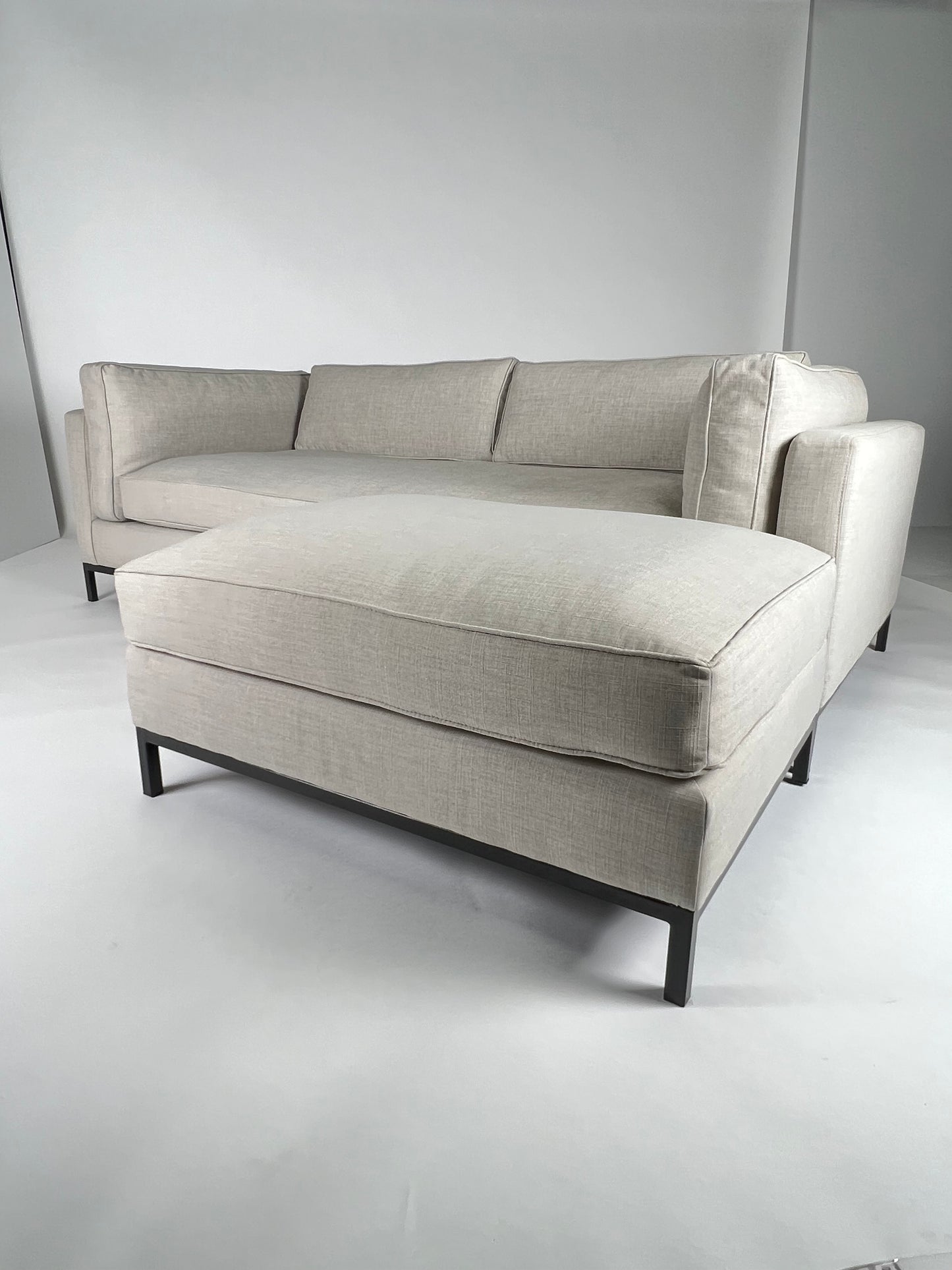 Light gray sectional with black iron base, LAF or RAF