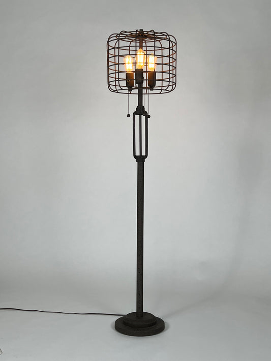 Rust black cage head floor lamp with Edison bulbs