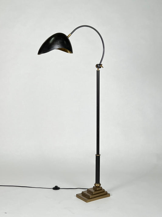 Brass and black articulating floor lamp