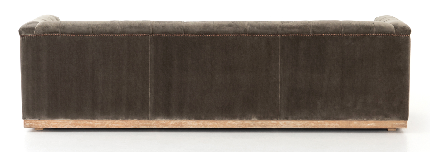 Brown tufted velvet library sofa with aged bronze nailhead trim