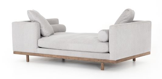 Pale gray tete a tete chaise lounger with bolsters