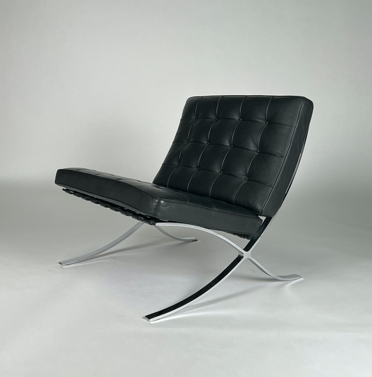 Black leather Knoll Barcelona chair with silver legs and back