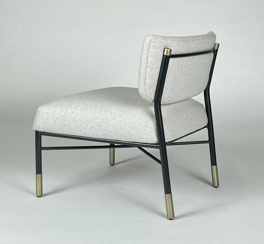 Gray wool like fabric, black iron frame chair with pewter tipped feet