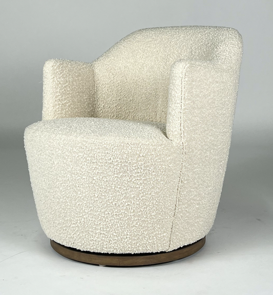 Cream boucle fabric swivel chair, wooden base