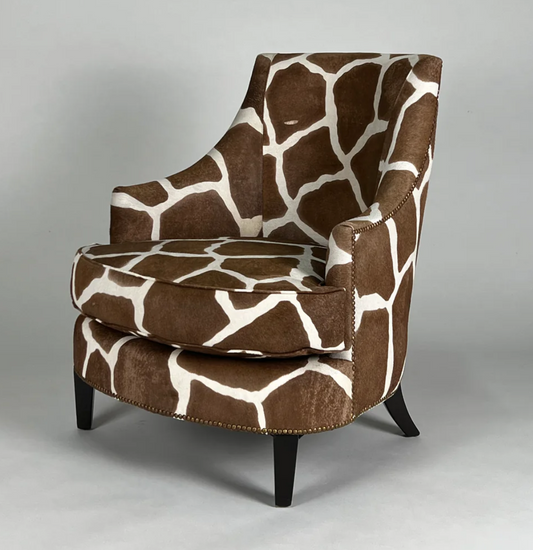 Hair on hide, brown and cream, giraffe print chair with dark brown legs.