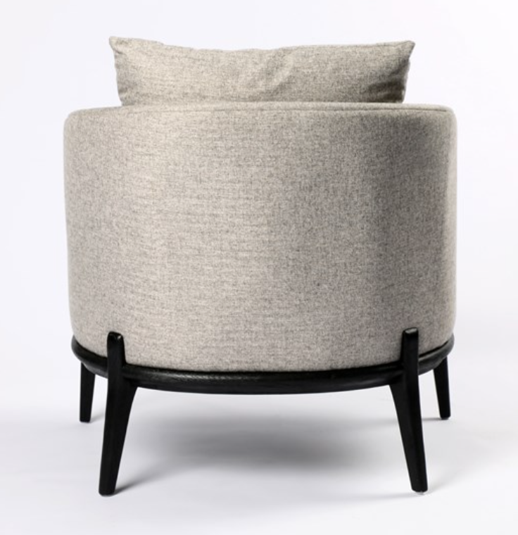 Light gray chair with subtle herringbone fabric, black frame
