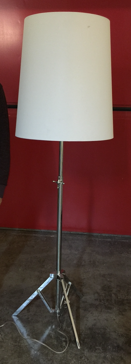 Tripod chrome floor lamp with tall cream shade