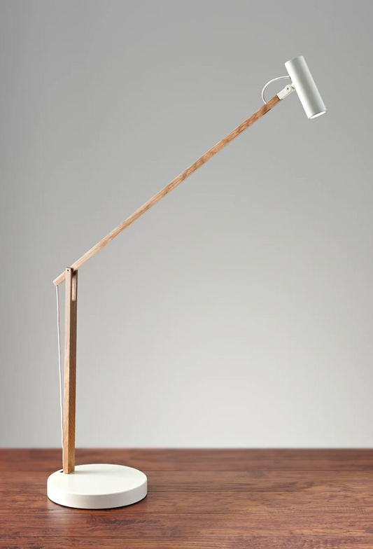 Crane desk or table lamp of slim wood with white head, articulates