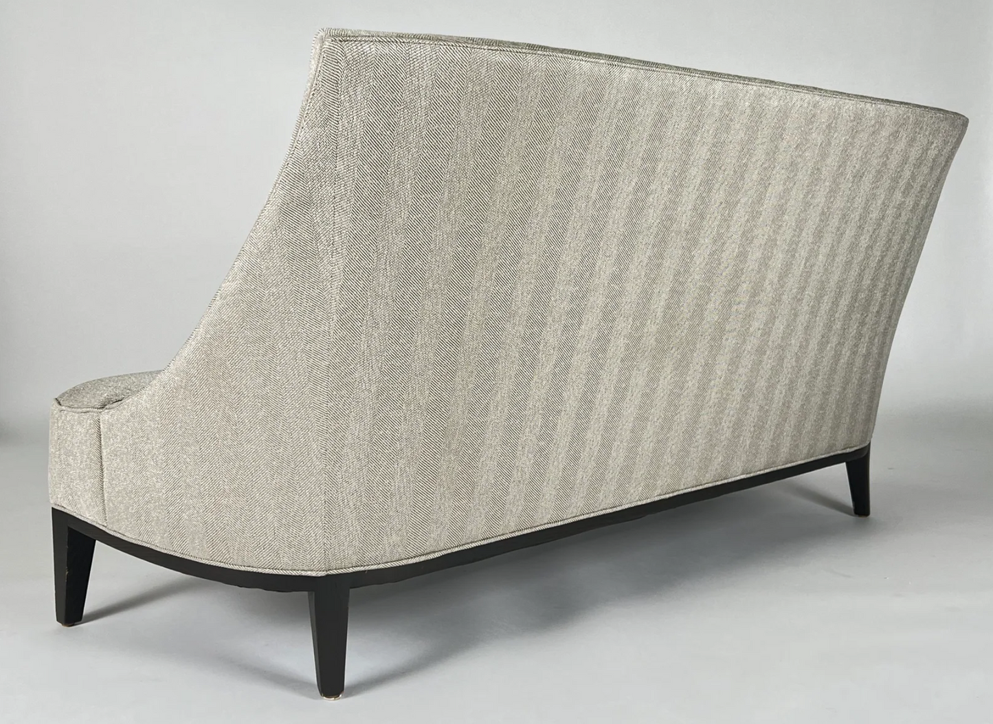 Cream curved back sofa, herringbone pattern