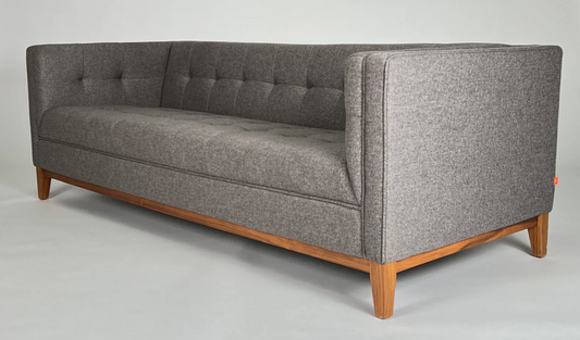 Tight back, tufted, brown tweed sofa with wood frame and wood legs