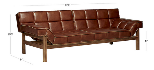 Brown leather channeled sofa, sling back, brown wood frame. 