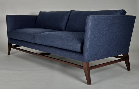 Indigo flannel sofa, dark walnut wood frame
