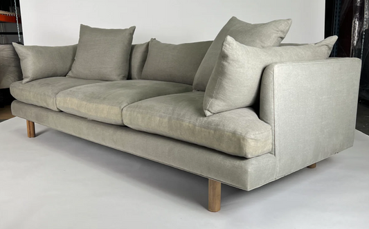 Sage linen sofa with deep seat and natural wooden legs