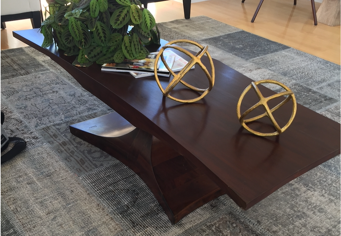 Dark wood whale tail coffee table