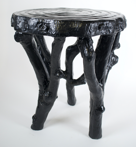 Black cast resin side table, live edge top, branch legs