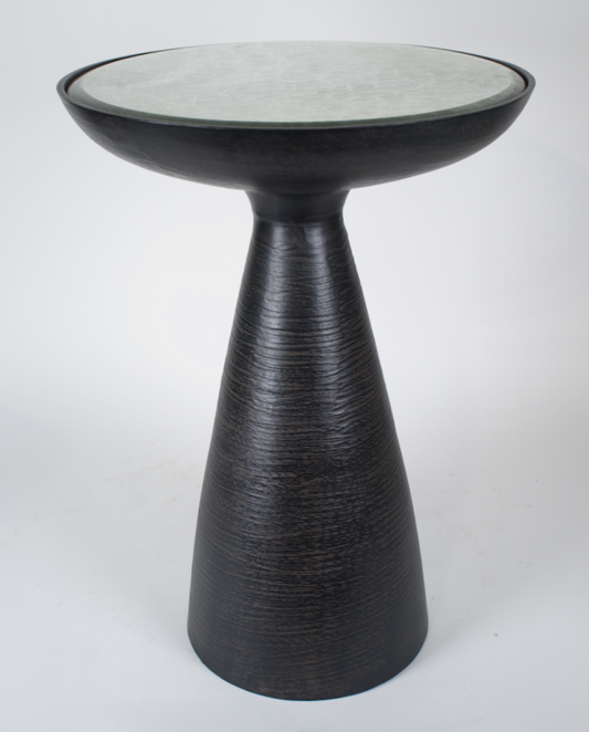 Black metal pedestal side table with beveled antique mirrored top