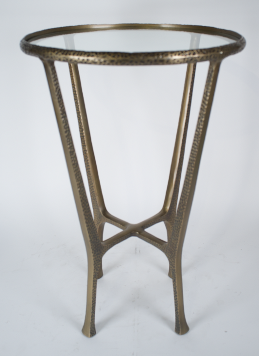 Round glass top atop brass base