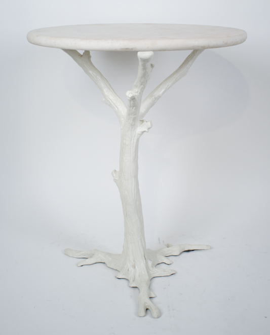 White faux bois side table with round white marble top