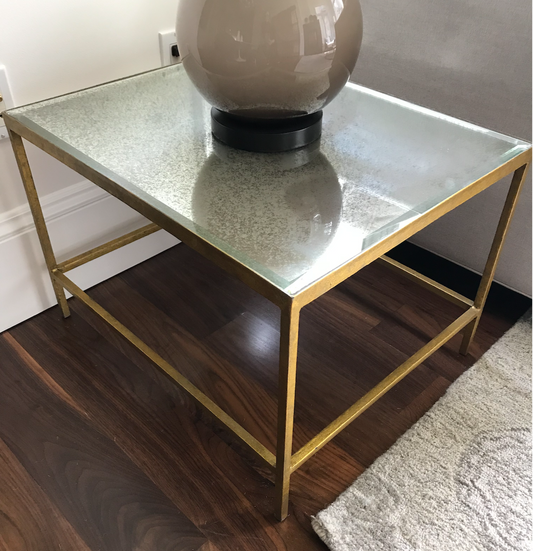 Rectangular brass side table with antique mirror top