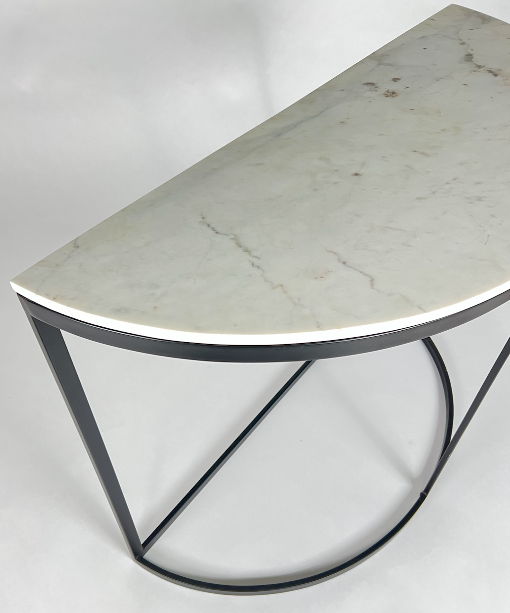 Marble top demi lune console table with black base