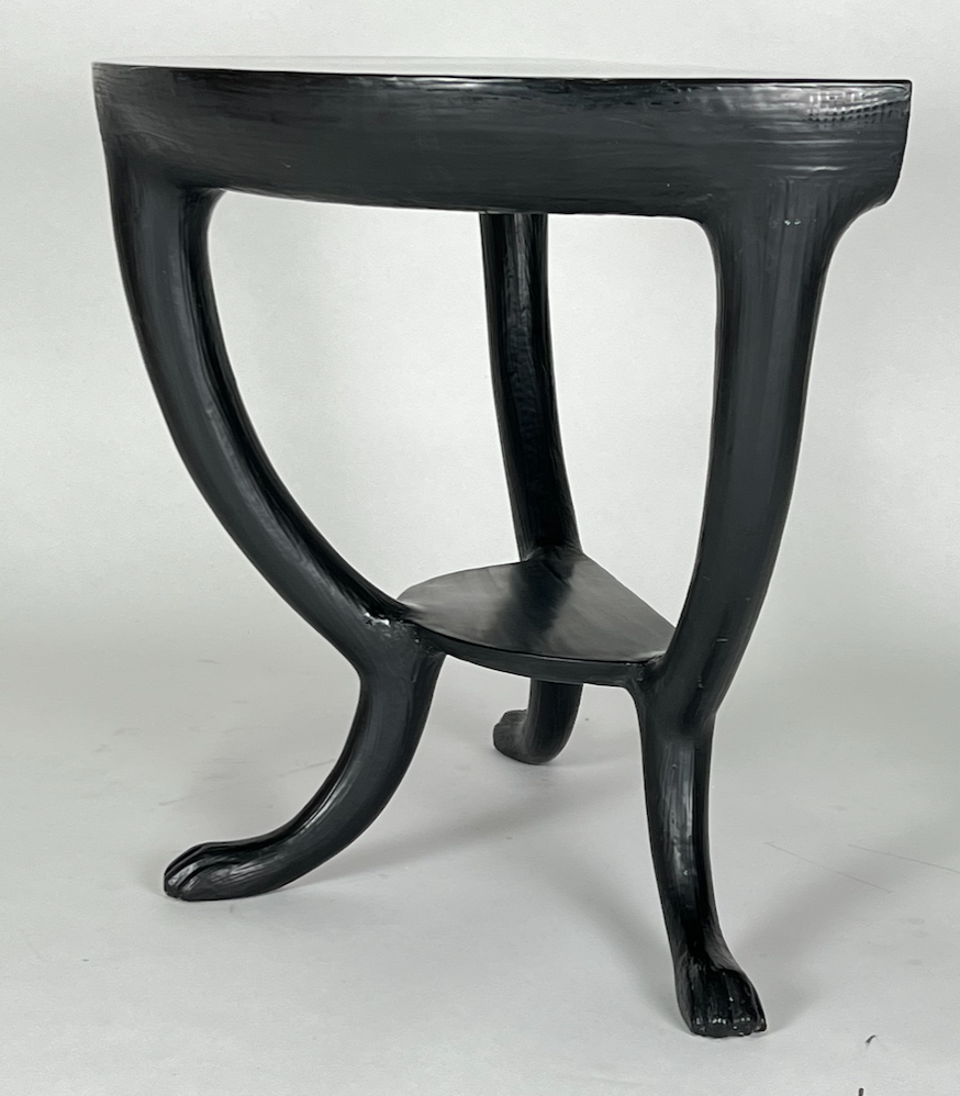 Black resin cast demi lune console table