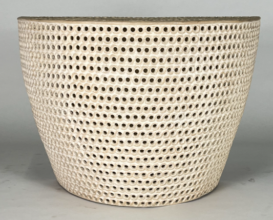 Cream ceramic perforated demi lune console table