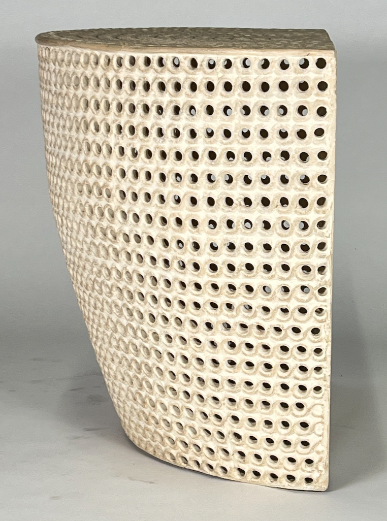 Cream ceramic perforated demi lune console table