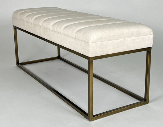 Cream channeled bench with brass frame