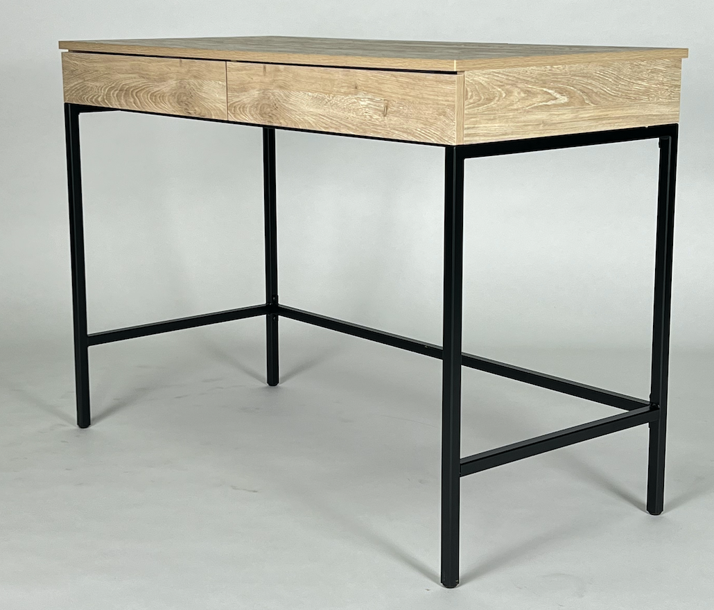 Light wood desk with black frame
