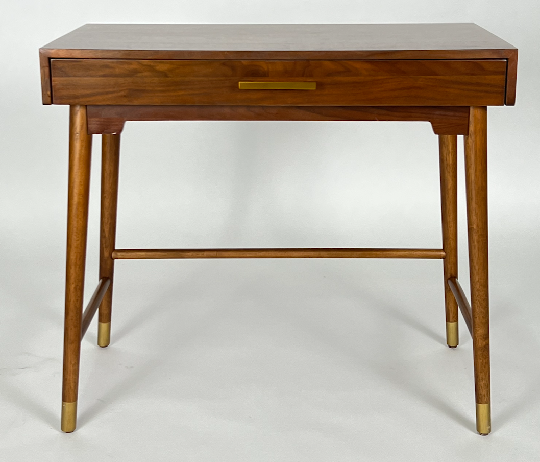Warm wood desk with brass tipped legs