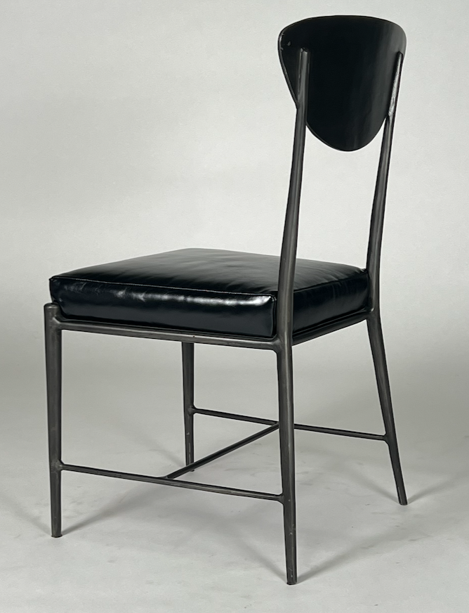 Black metal dining chair with black leather seat