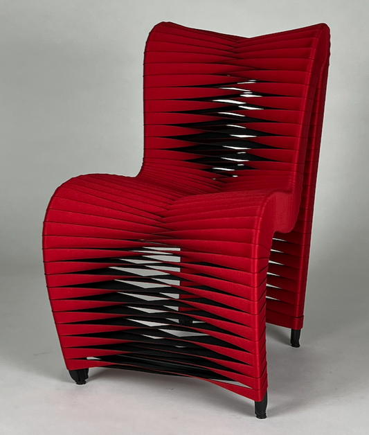 Curvaceous red seat belt chair