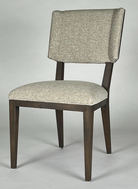 Light tan speckled fabric with wood frame dining chair