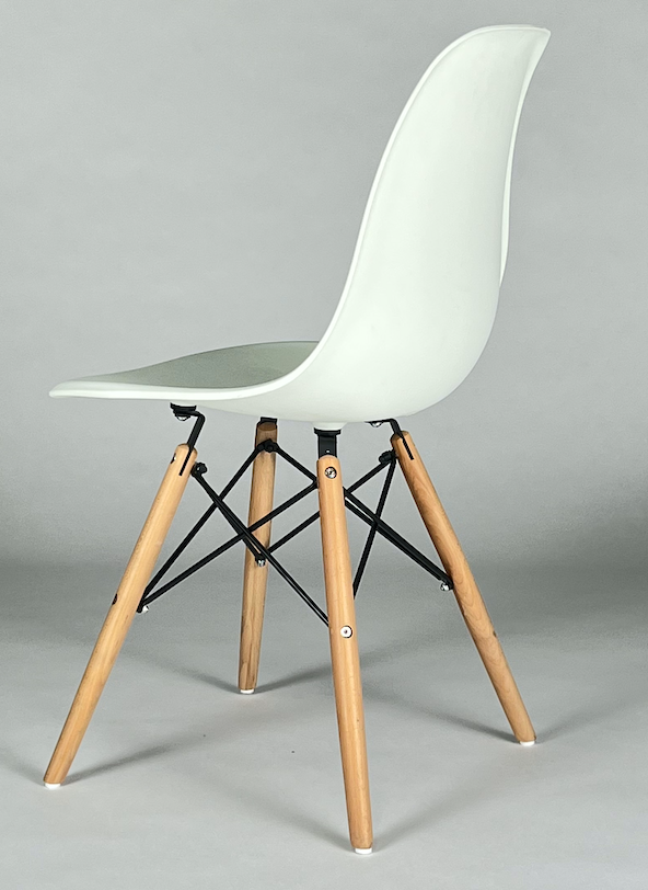White Eames like molded bucket chair